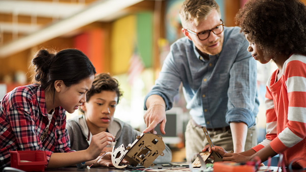 Student and teacher Working together
